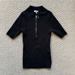 Black ribbed collar short sleeve shirt with zipper pull